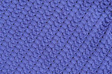 Abstract textured background of close up detail of knitting in a handmade sweater
