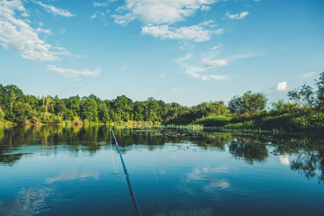 Fishing on the banks of the picturesque river. Fly fishing