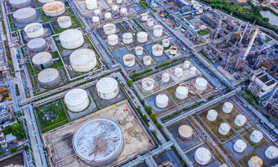 Oil storage tank with oil refinery background, Oil refinery plant at day. Aerial view from drone top view