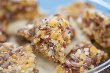 Granola with Greek yogurt in a glass beaker, close-up macro. Healthy and natural food, delicious breakfast.