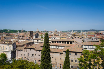 Roofs and churches of Rome seen from a terrace