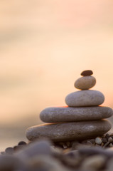 stack of zen stones on pebble beach