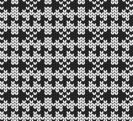 Geometric background. Seamless decorative background. Jacquard weave. Knitted pattern.