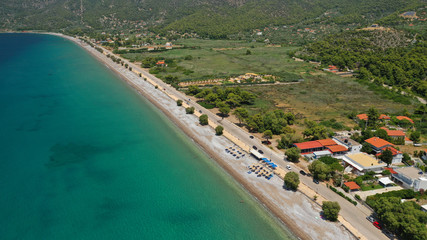 Fototapeta na wymiar Aerial panoramic photo of famous sandy beach of Psatha in West Attica with emerald clear sea, Corinthian gulf, Greece