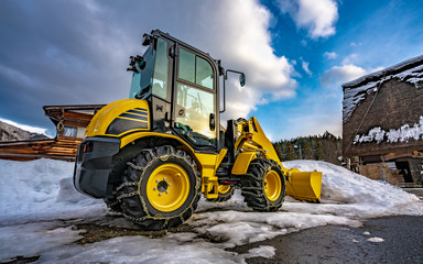 Fototapeta premium Parking Snow Plowing Truck In Winter