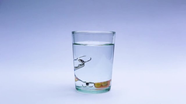 Clean and disinfect denture by putting a tablet to denture in a glass filled with fresh water