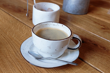 Cup of coffee for business breakfast. Wooden Background. - Image