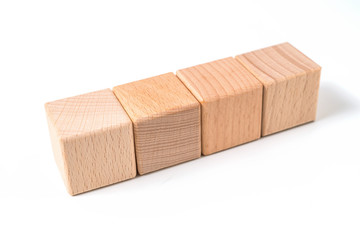 Business concept - Abstract geometric real floating wooden cube on grey background and it's not 3D render