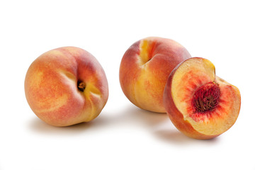 fresh peaches isolated on white background
