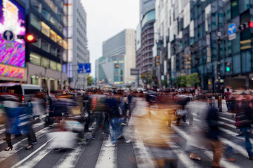 People walking in pedestrian crossing in Osaka