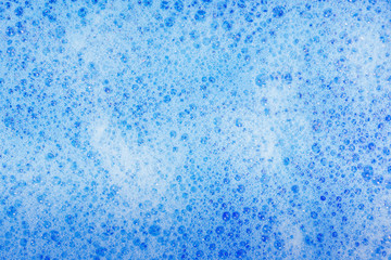 Soap bubbles background- suds liquid