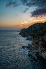 Rocky coastline during sunset