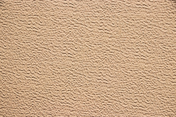 Beige painted grunge wall rough texture