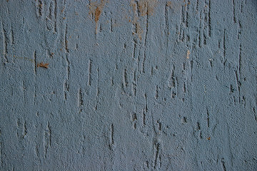 Blue painted plaster rough texture