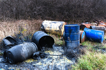 Barrels of toxic waste in nature