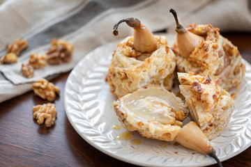 Baked filled pears with mascarpone honey and walnuts.