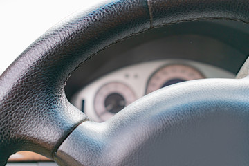 Fragments of the interior,steering wheel,trim,car seats
