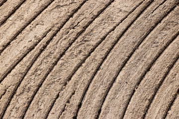 Curved concrete plaster lines texture