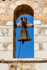 Fototapeta premium Detail of architecture belfry in Vathia town, Mani Greece.