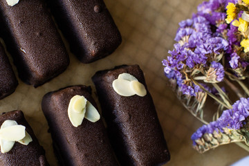 Raw vegan chocolate bars. Healthy desserts, close up