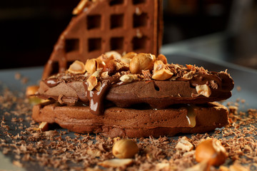 delicious waffles with chocolate and nuts