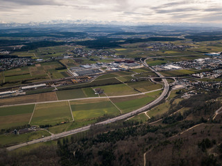 Aerial view urban sprawl Jura mountains in Switzerland