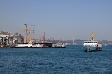Steamers floating on the sea.
