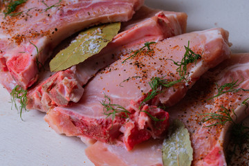 Juicy raw pork steak meat ready for grill. Selective focus.