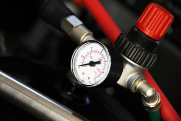 The valve and pressure indicator part of machine