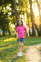 Little cute girl laugh in park