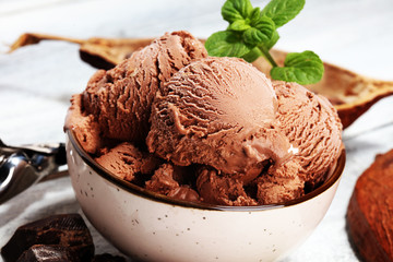 Chocolate coffee ice cream ball in a bowl. ice cream scoop