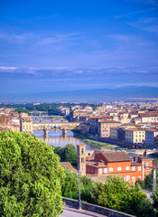 Fototapeta premium Florence, Italy along the Arno River.
