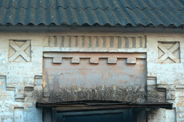 Decorative brick element of the facade wall of the building of the nineteenth century