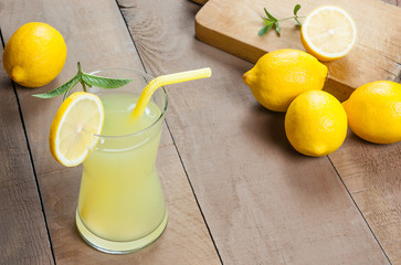 Lemonade in glass.Homemade Refreshment Summer cold drink with fresh lemons and mint. Lemon mojito...