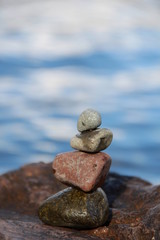 Fototapeta na wymiar balanced stones on the beach