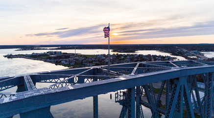 Cape Cod Railroad Bridge Flag Sunset