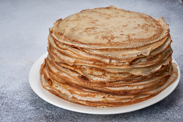 fresh pancakes on a plate white background