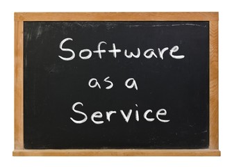 Software as a service written in white chalk on a black chalkboard isolated on white