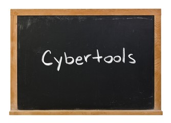 Obraz premium Cybertools written in white chalk on a black chalkboard isolated on white