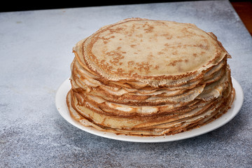 fresh pancakes on a plate white background