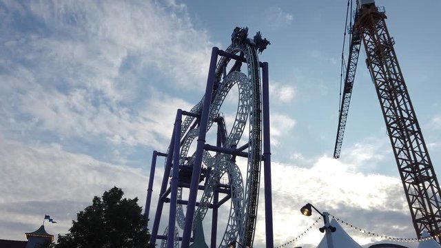 Walking toward insane attraction at djurgarden, Stockholm. Construction crane at place building the park.