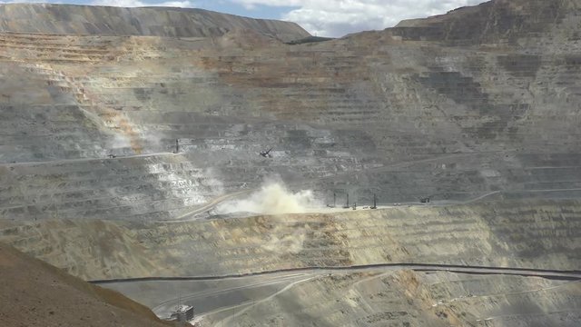 Controlled explosion in copper mine in Utah USA