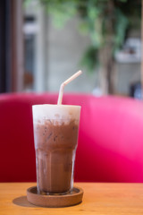 Iced chocolate cocoa glass and straw