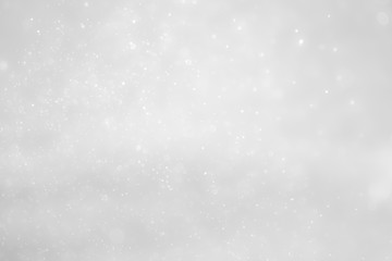 White and Silver lights on bokeh abstract background.