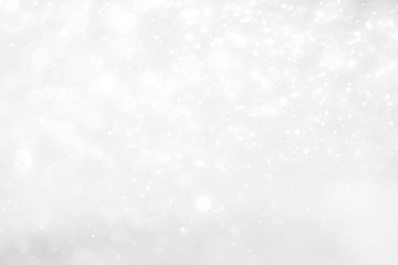 White and Silver lights on bokeh abstract background.