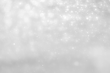 White and Silver lights on bokeh abstract background.