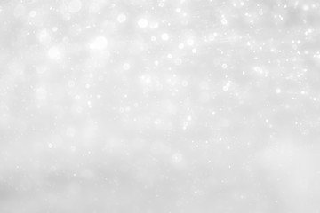 White and Silver lights on bokeh abstract background.