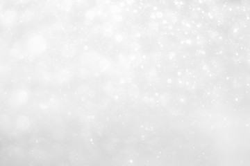 White and Silver lights on bokeh abstract background.