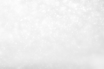 White and Silver lights on bokeh abstract background.