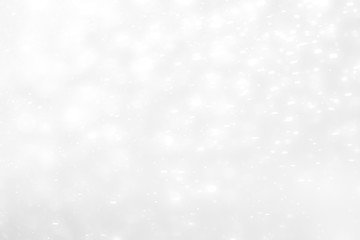 White and Silver lights on bokeh abstract background.